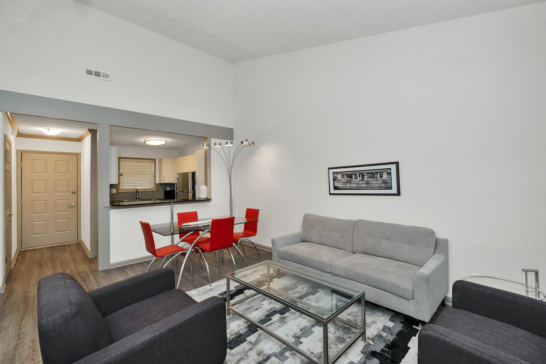 An apartment living area with a kitchen